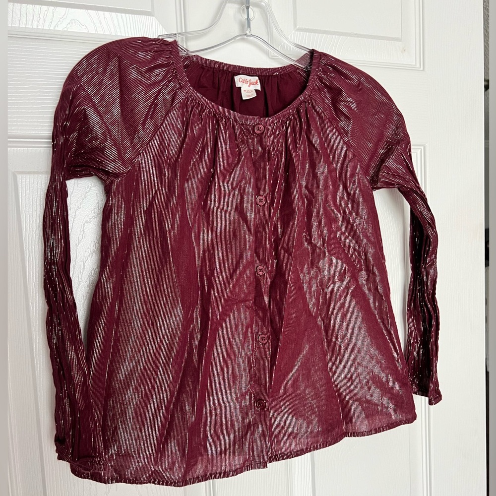 Girls metallic button up shirt.
